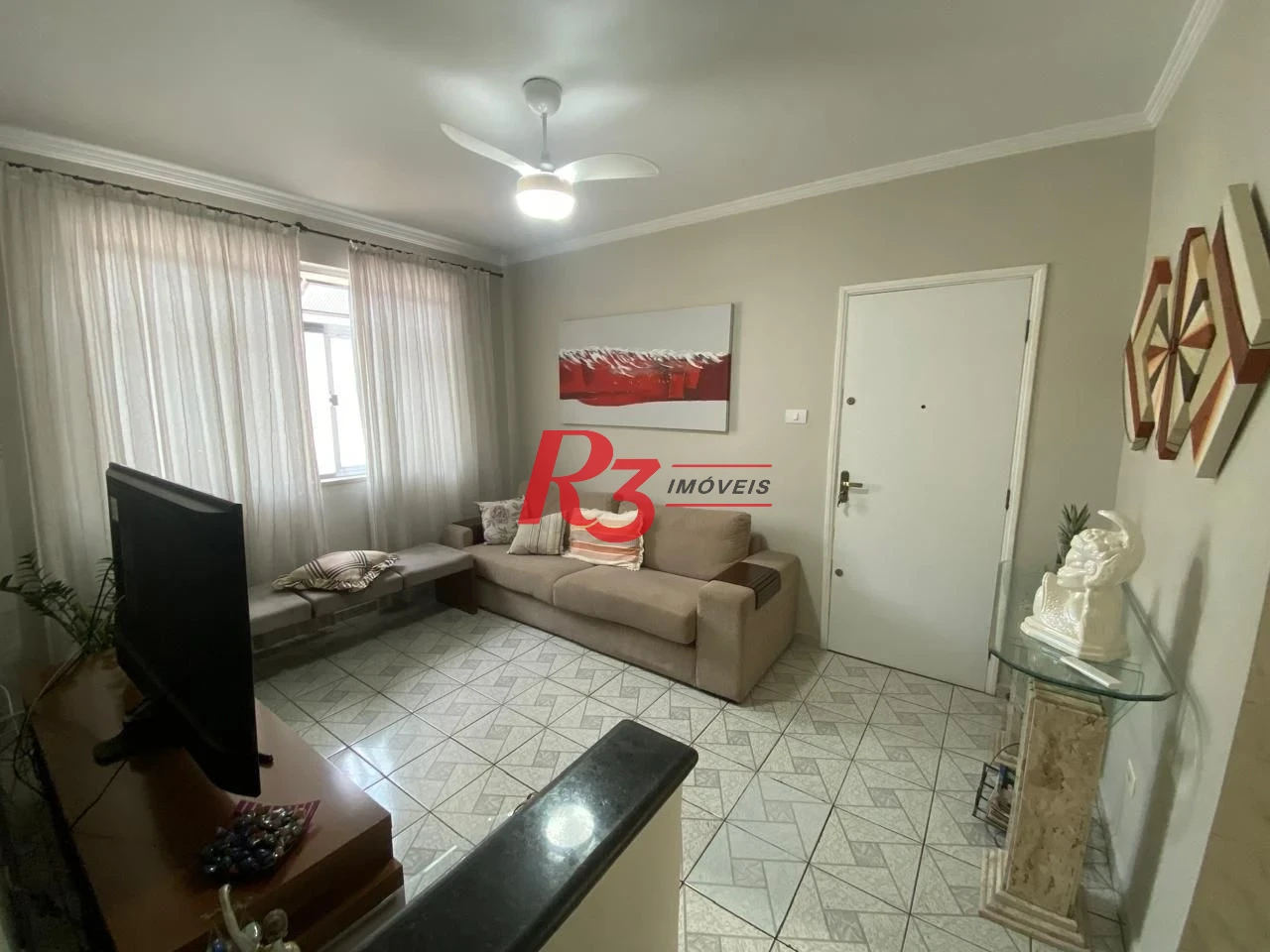 Apartamento com 2 dormitórios à venda, 40 m² por R$ 440.000,00 - Gonzaga - Santos/SP
