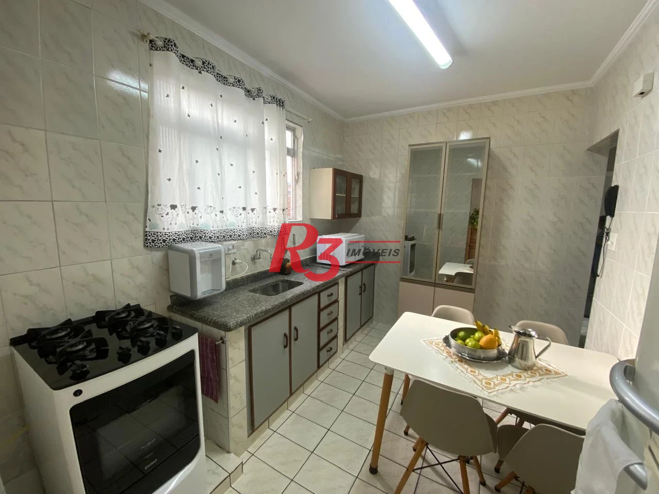 Apartamento com 2 dormitórios à venda, 40 m² por R$ 440.000,00 - Gonzaga - Santos/SP