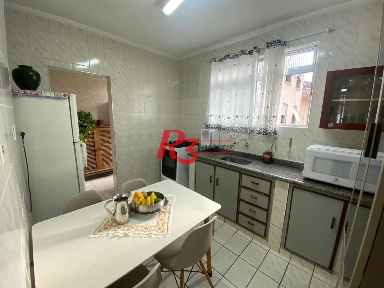Apartamento com 2 dormitórios à venda, 40 m² por R$ 440.000,00 - Gonzaga - Santos/SP