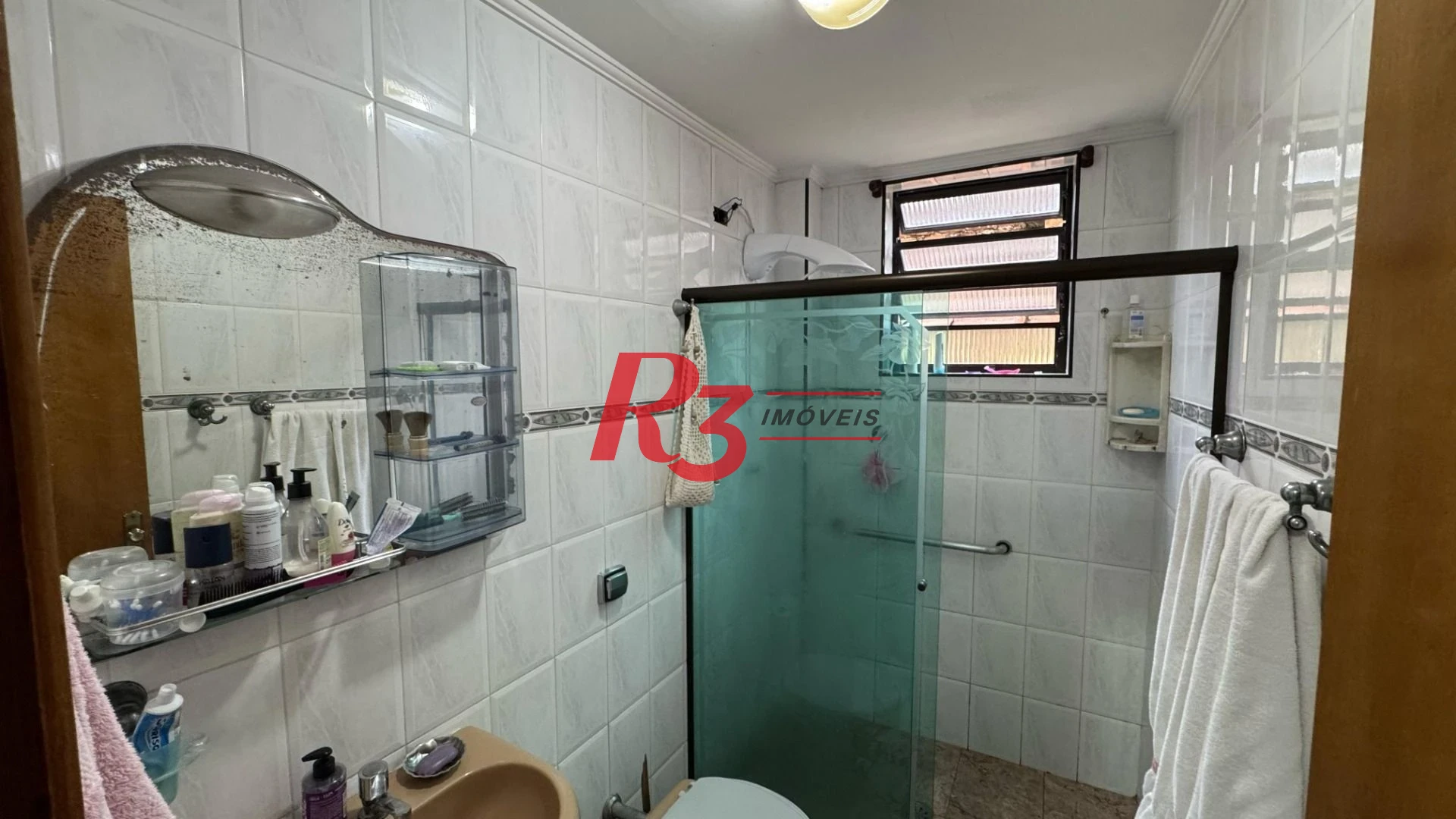 Casa com 3 dormitórios, 152 m² - venda por R$ 960.000,00 ou aluguel por R$ 5.000,00/mês - Campo Grande - Santos/SP