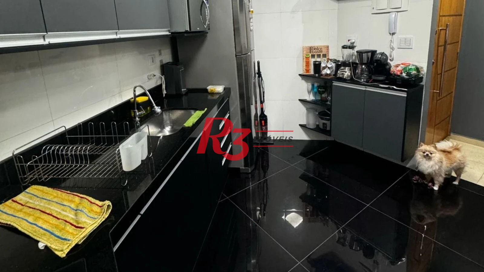 Apartamento com 2 dormitórios à venda, 70 m² por R$ 300.000,00 - Saboó - Santos/SP