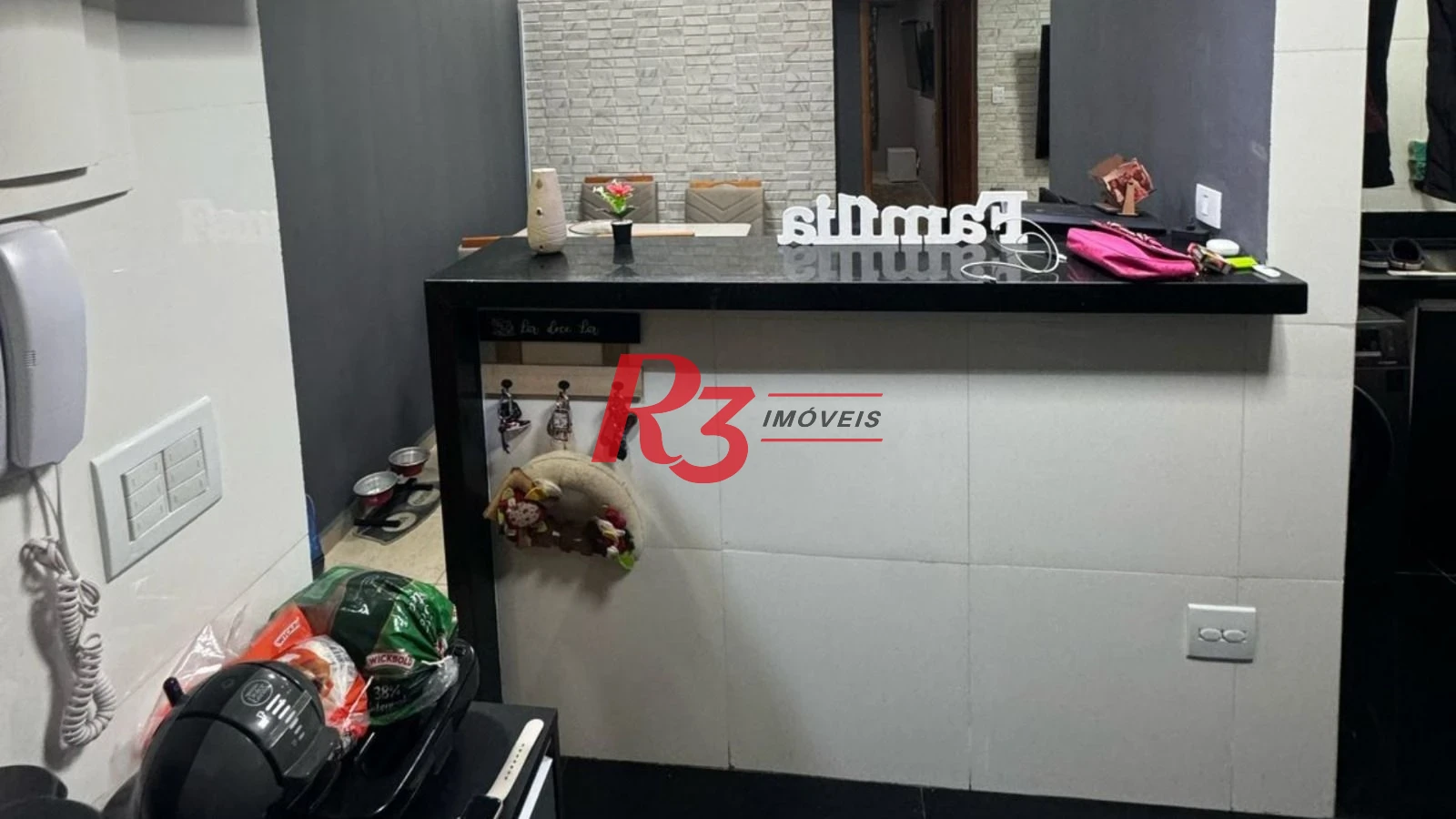 Apartamento com 2 dormitórios à venda, 70 m² por R$ 300.000,00 - Saboó - Santos/SP