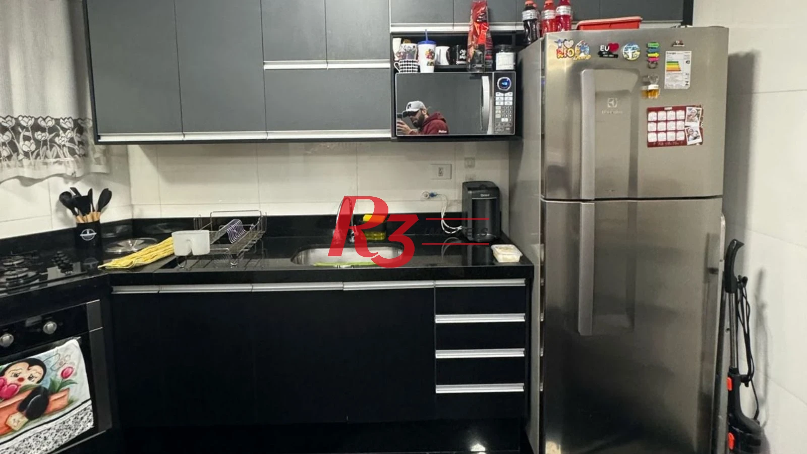 Apartamento com 2 dormitórios à venda, 70 m² por R$ 300.000,00 - Saboó - Santos/SP