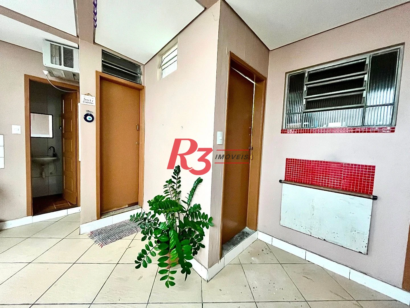 Casa com 3 dormitórios à venda, 233 m² por R$ 1.200.000,00 - Campo Grande - Santos/SP