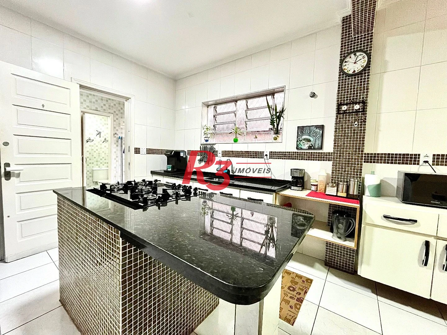 Casa com 3 dormitórios à venda, 233 m² por R$ 1.200.000,00 - Campo Grande - Santos/SP