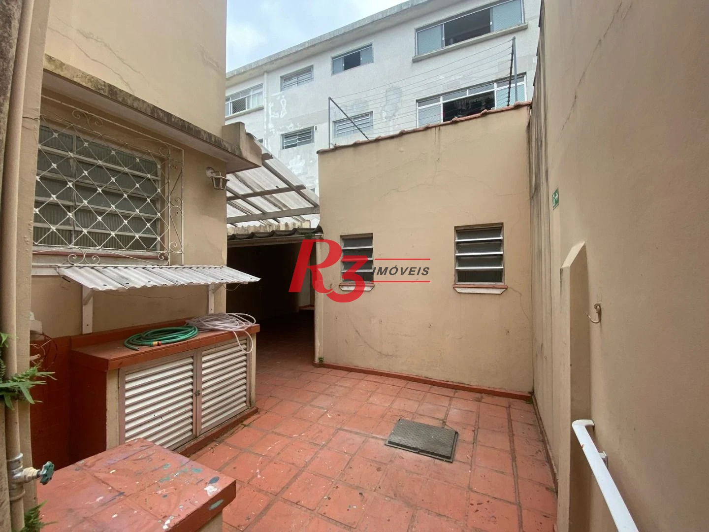 Sobrado com 4 dormitórios à venda, 249 m² por R$ 1.600.000,00 - Boqueirão - Santos/SP