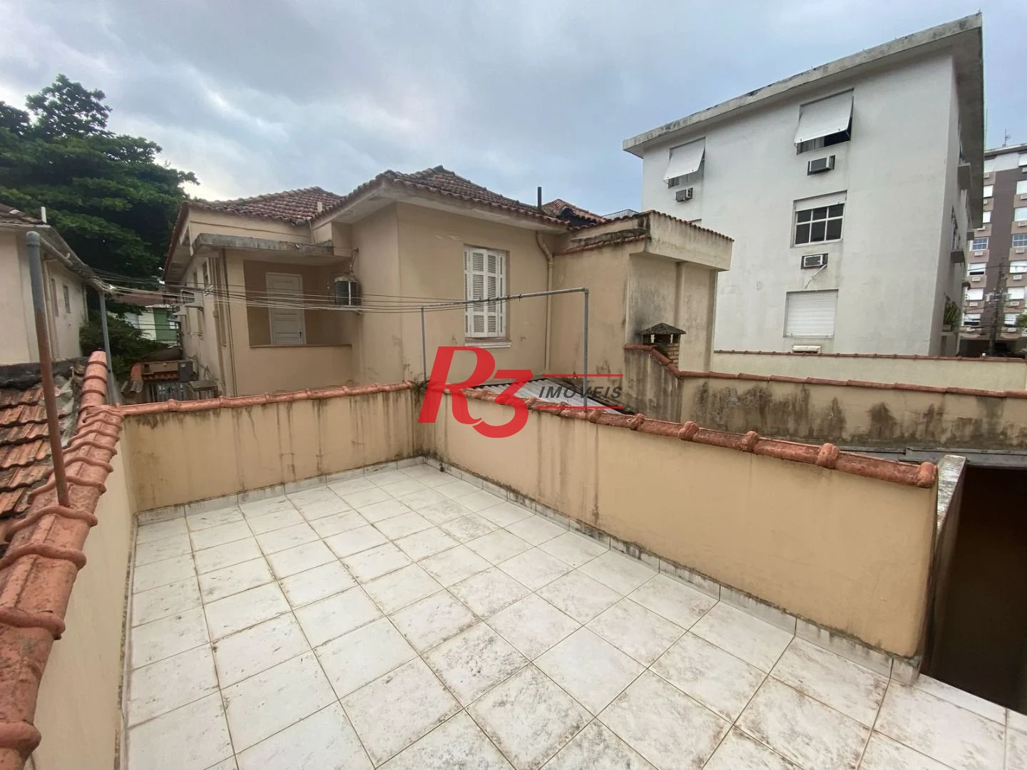 Sobrado com 4 dormitórios à venda, 249 m² por R$ 1.600.000,00 - Boqueirão - Santos/SP