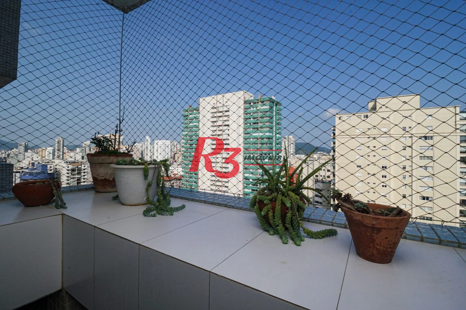 Apartamento com 3 dormitórios à venda, 131 m² por R$ 1.840.000,00 - Boqueirão - Santos/SP