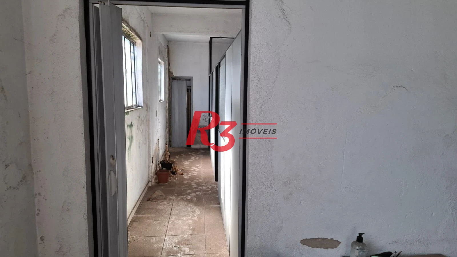Prédio comercial à venda, 315 m² por R$ 450.000 - Estuário - Santos/SP