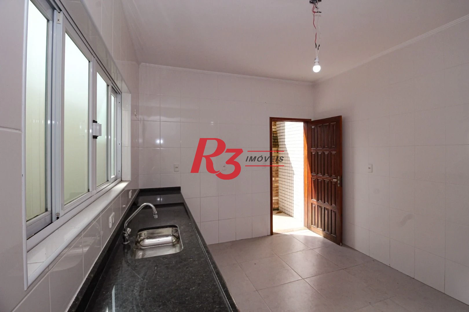 Casa com 4 dormitórios à venda, 170 m² por R$ 1.100.000,00 - Vila Belmiro - Santos/SP