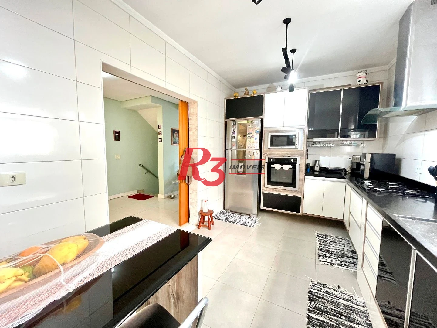 Casa com 4 dormitórios à venda, 225 m² por R$ 1.390.000,00 - Aparecida - Santos/SP