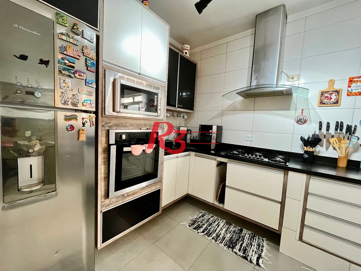Casa com 4 dormitórios à venda, 225 m² por R$ 1.390.000,00 - Aparecida - Santos/SP
