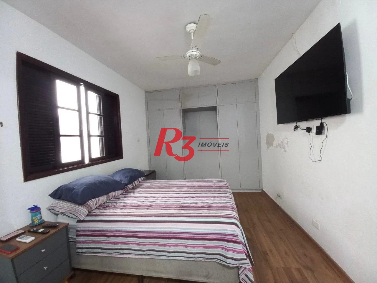 Sobrado com 3 dormitórios à venda, 180 m² por R$ 800.000,00 - Campo Grande - Santos/SP