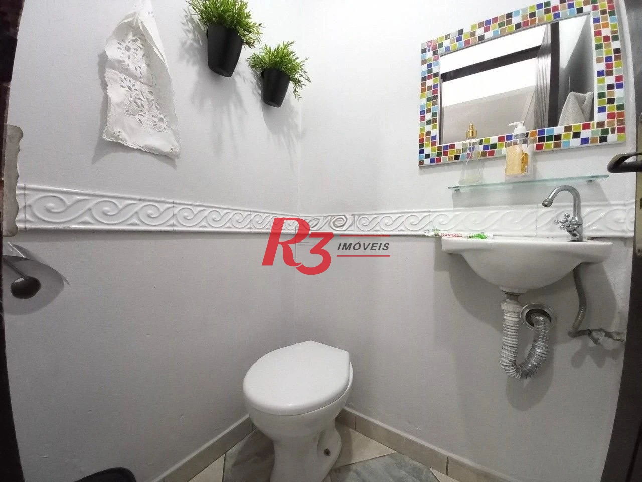 Sobrado com 3 dormitórios à venda, 180 m² por R$ 800.000,00 - Campo Grande - Santos/SP