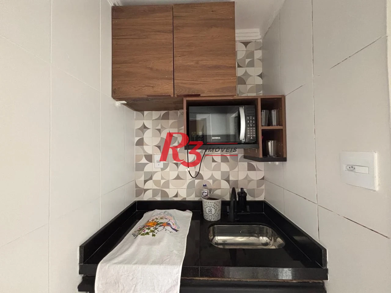 Kitnet reformada e mobiliada à venda, 40 m² por R$ 340.000 - Gonzaga - Santos/SP