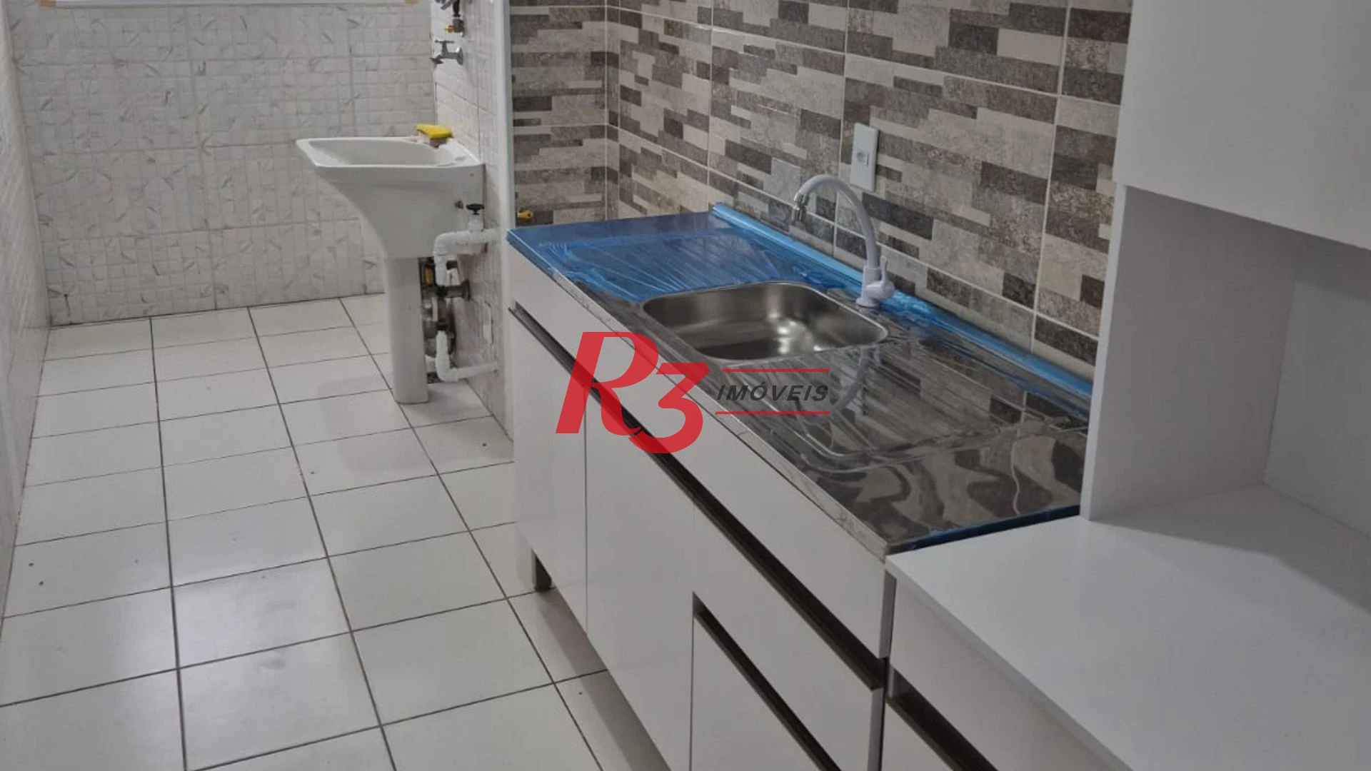 Apartamento à venda, 57 m² por R$ 340.000,00 - Areia Branca - Santos/SP