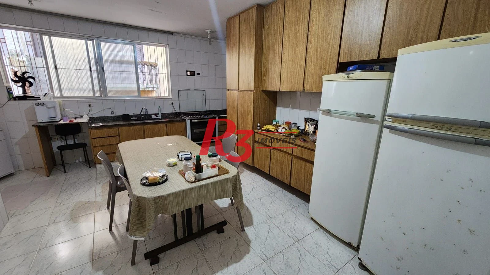Sobrado com 3 dormitórios à venda, 330 m² por R$ 3.300.000,00 - Aparecida - Santos/SP