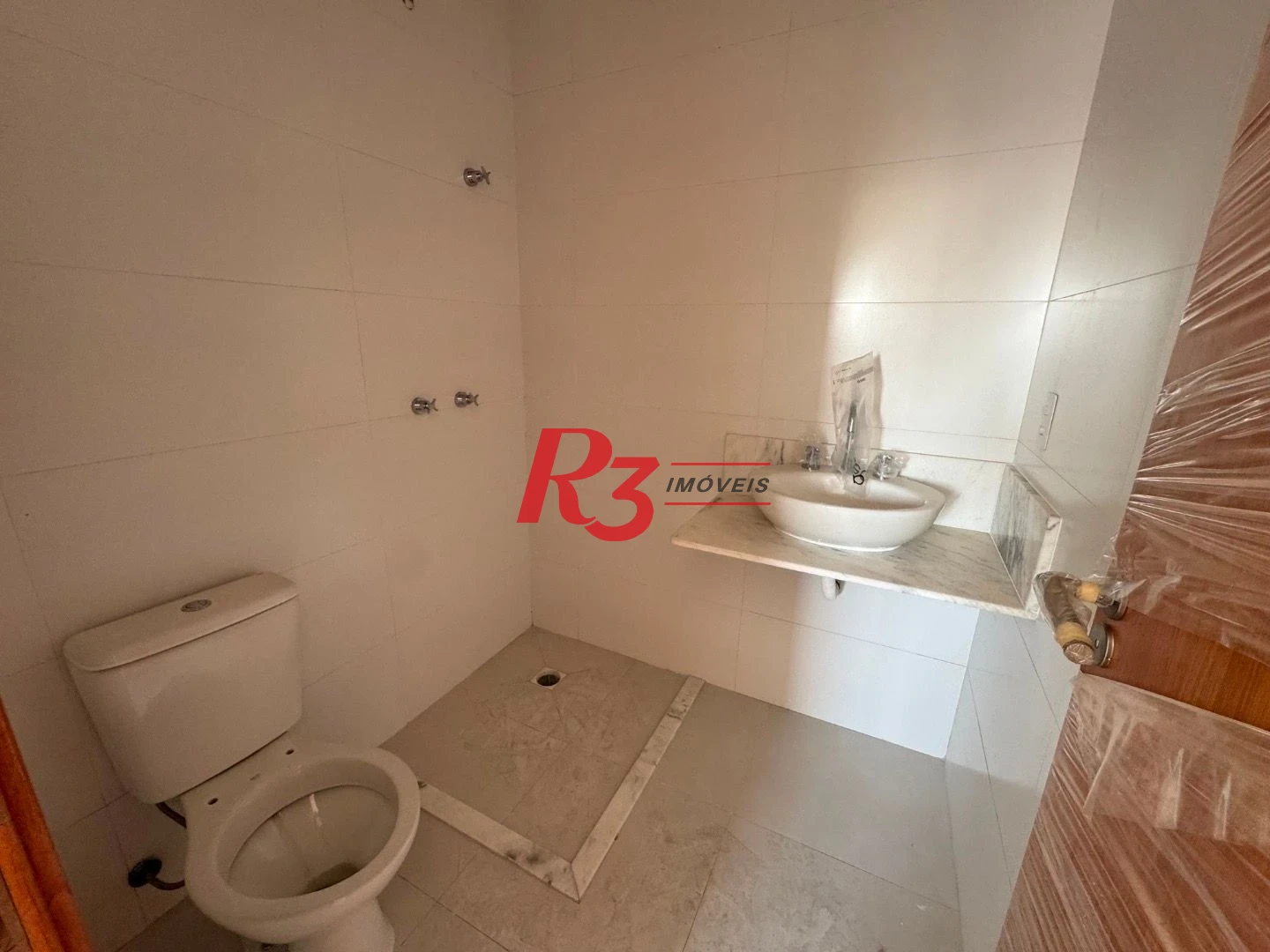 Apartamento com 2 dormitórios à venda, 77 m² por R$ 560.000,00 - Ponta da Praia - Santos/SP