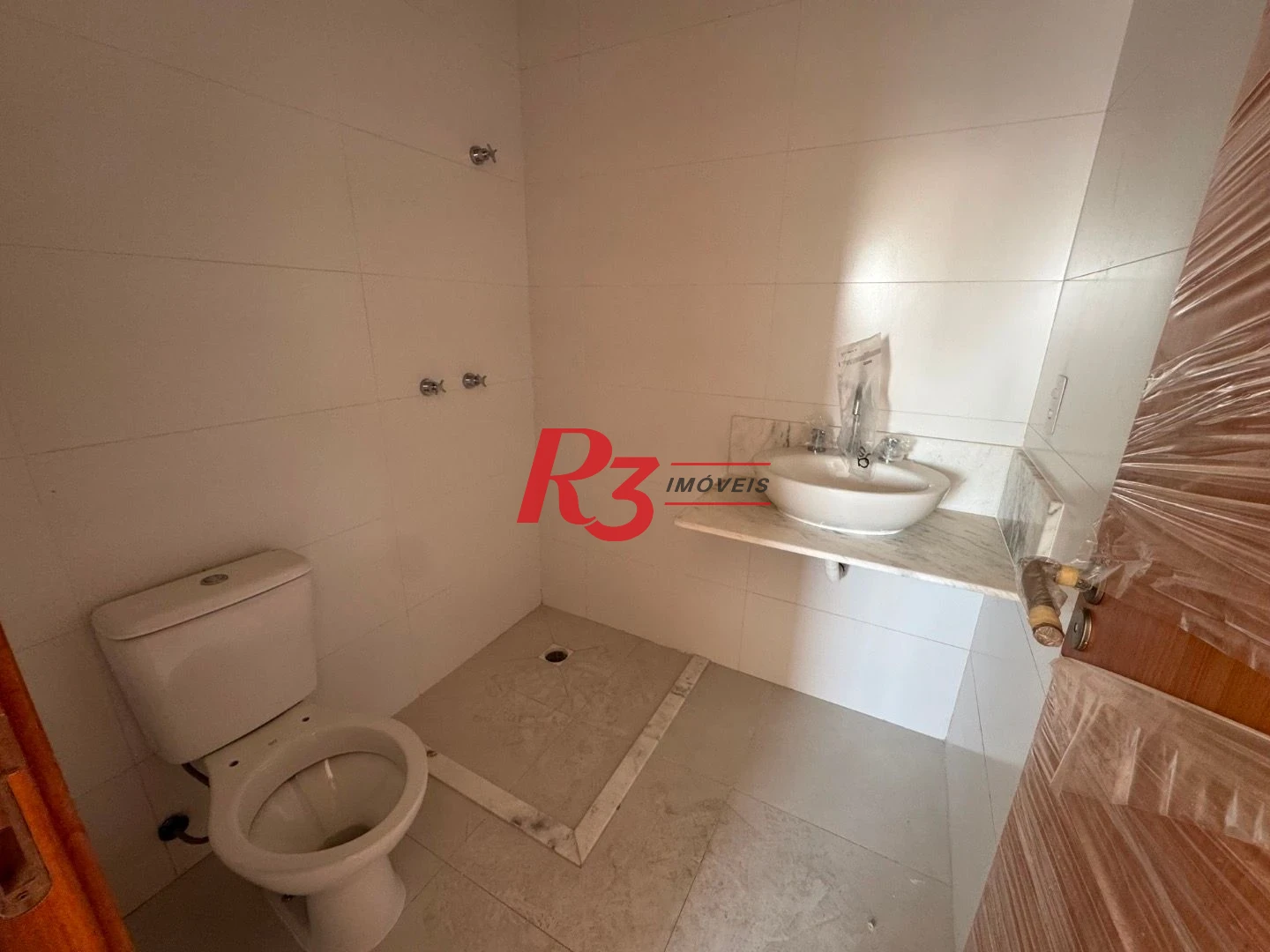 Apartamento com 2 dormitórios à venda, 77 m² por R$ 560.000,00 - Ponta da Praia - Santos/SP