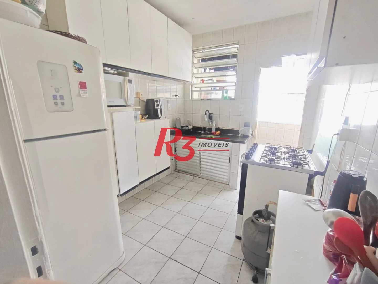 Apartamento com 2 dormitórios à venda, 70 m² por R$ 310.000,00 - Vila Matias - Santos/SP
