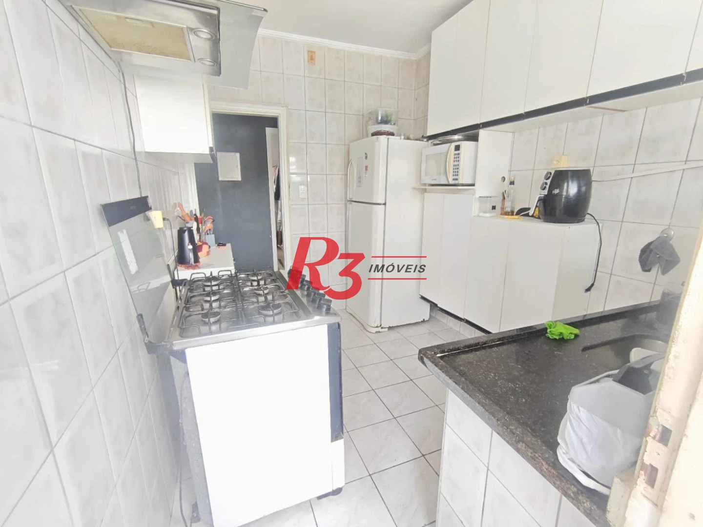 Apartamento com 2 dormitórios à venda, 70 m² por R$ 310.000,00 - Vila Matias - Santos/SP