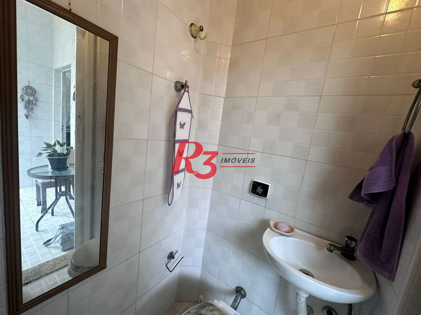 Casa com 3 dormitórios à venda, 118 m² por R$ 720.000,00 - Marapé - Santos/SP