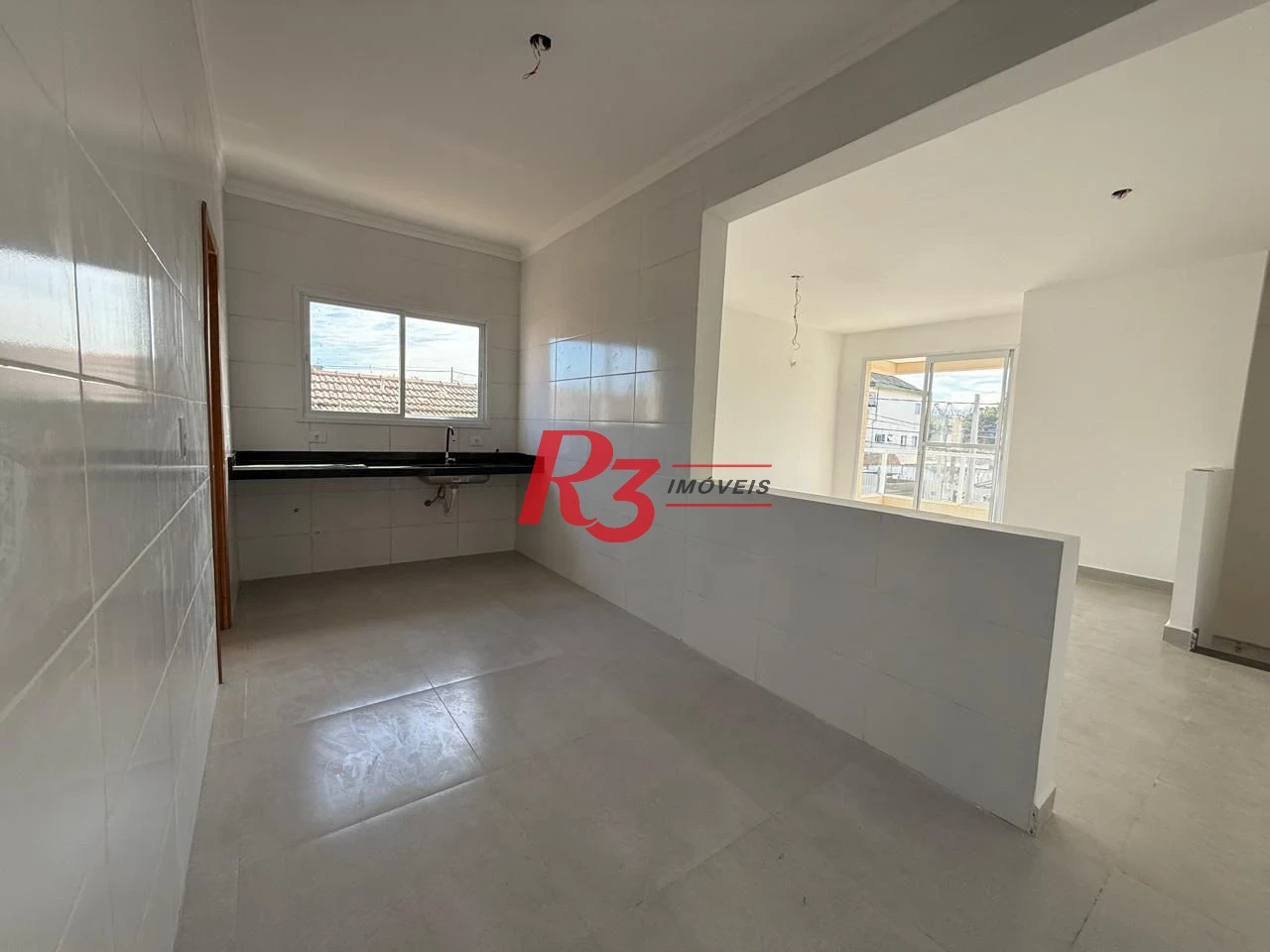 Casa com 3 dormitórios à venda, 135 m² por R$ 600.000,00 - Estuário - Santos/SP