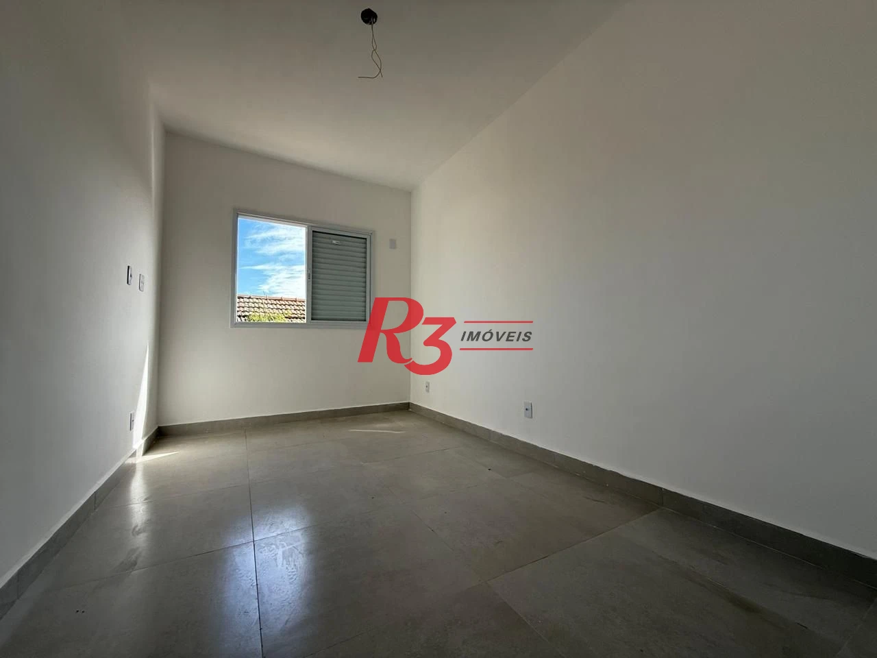 Casa com 3 dormitórios à venda, 135 m² por R$ 600.000,00 - Estuário - Santos/SP