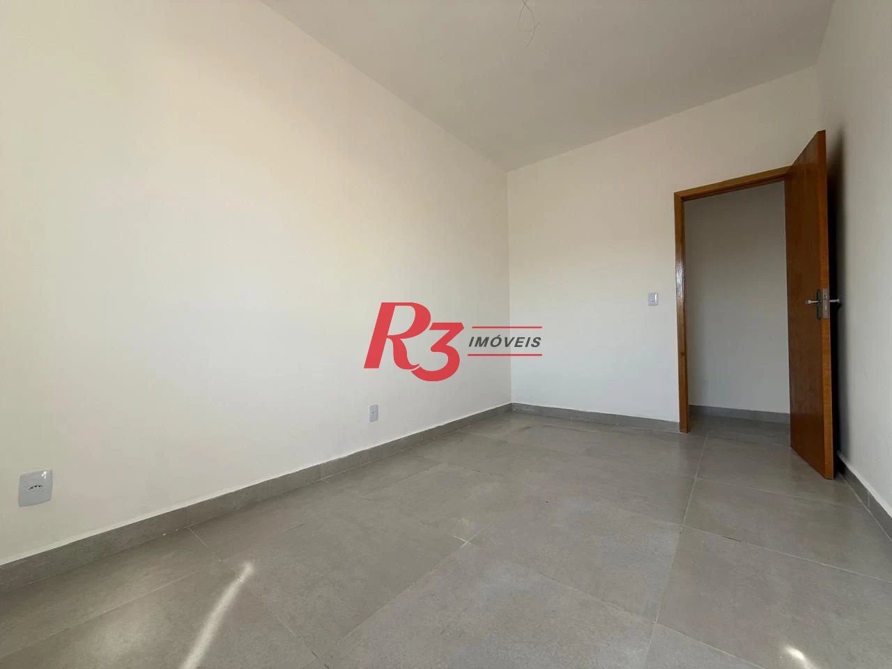 Casa com 3 dormitórios à venda, 135 m² por R$ 600.000,00 - Estuário - Santos/SP