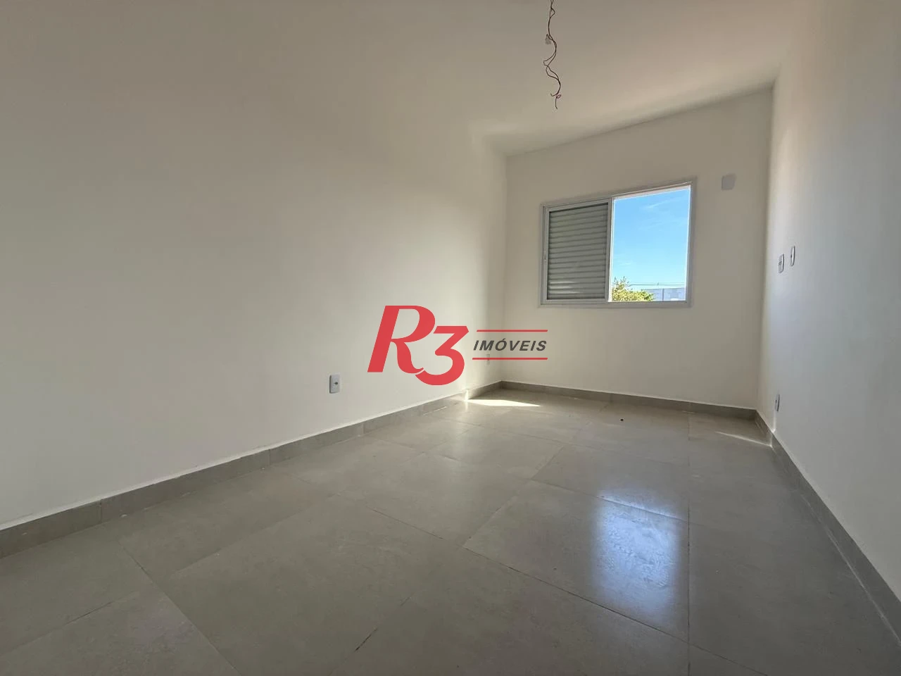 Casa com 3 dormitórios à venda, 135 m² por R$ 600.000,00 - Estuário - Santos/SP