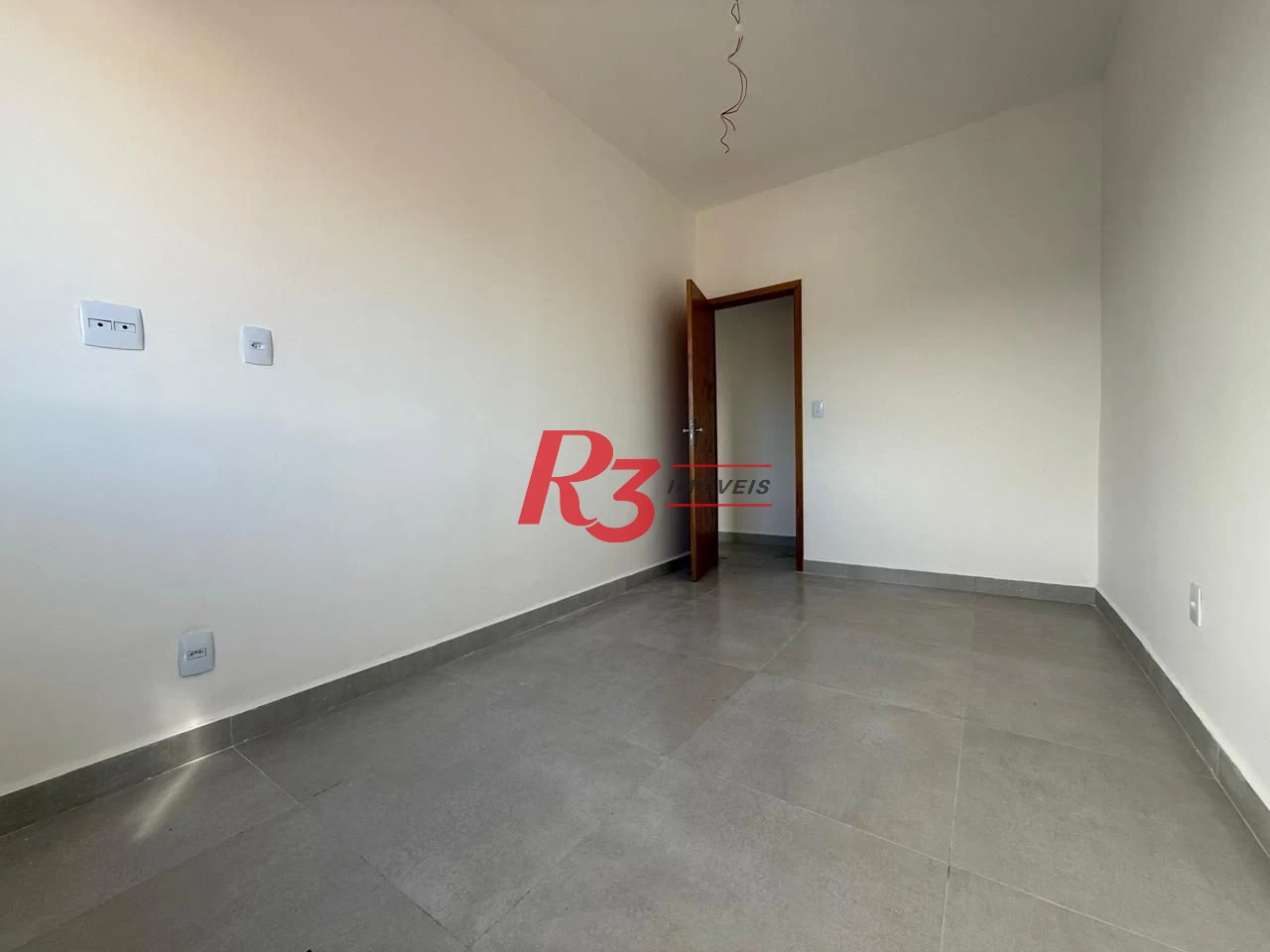 Casa com 3 dormitórios à venda, 135 m² por R$ 600.000,00 - Estuário - Santos/SP