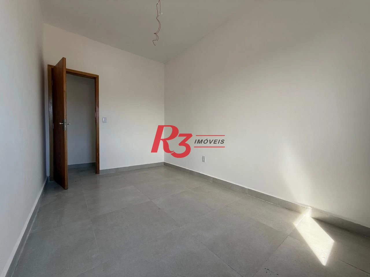 Casa com 3 dormitórios à venda, 135 m² por R$ 600.000,00 - Estuário - Santos/SP