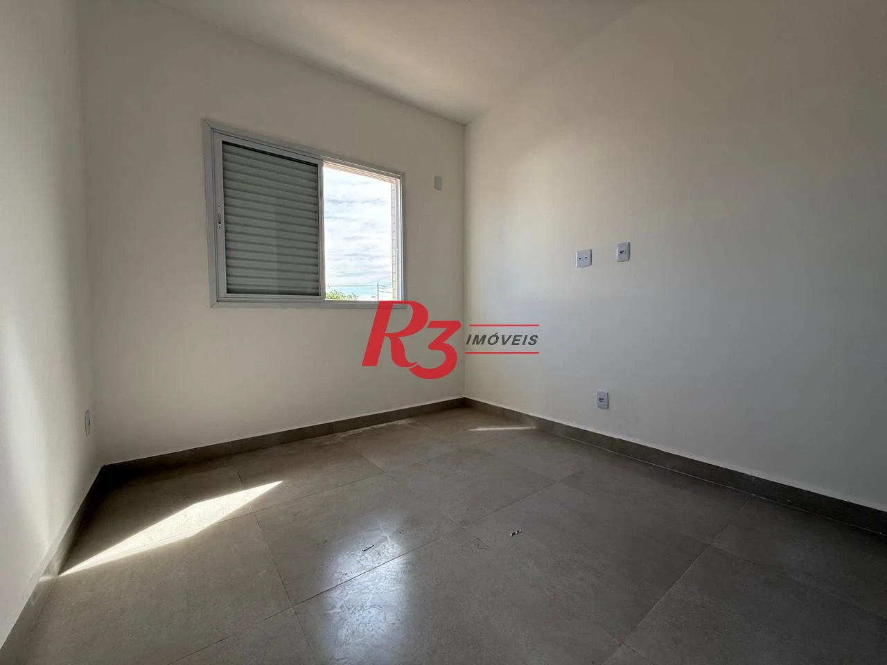 Casa com 3 dormitórios à venda, 135 m² por R$ 600.000,00 - Estuário - Santos/SP