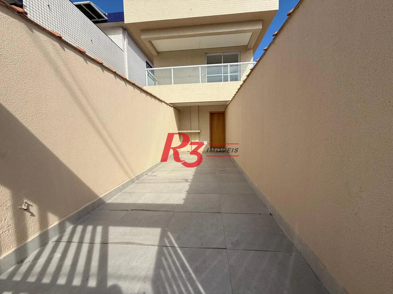 Casa com 3 dormitórios à venda, 135 m² por R$ 600.000,00 - Estuário - Santos/SP