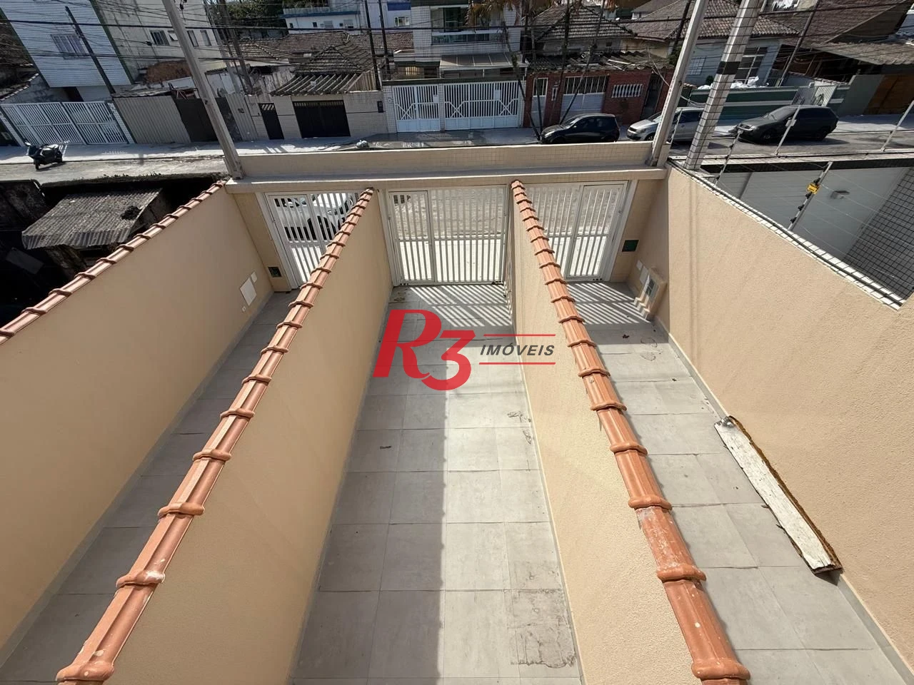 Casa com 3 dormitórios à venda, 135 m² por R$ 600.000,00 - Estuário - Santos/SP