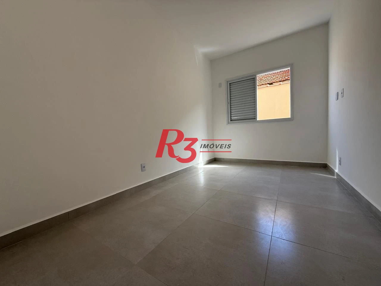 Casa com 3 dormitórios à venda, 134 m² por R$ 600.000,00 - Estuário - Santos/SP