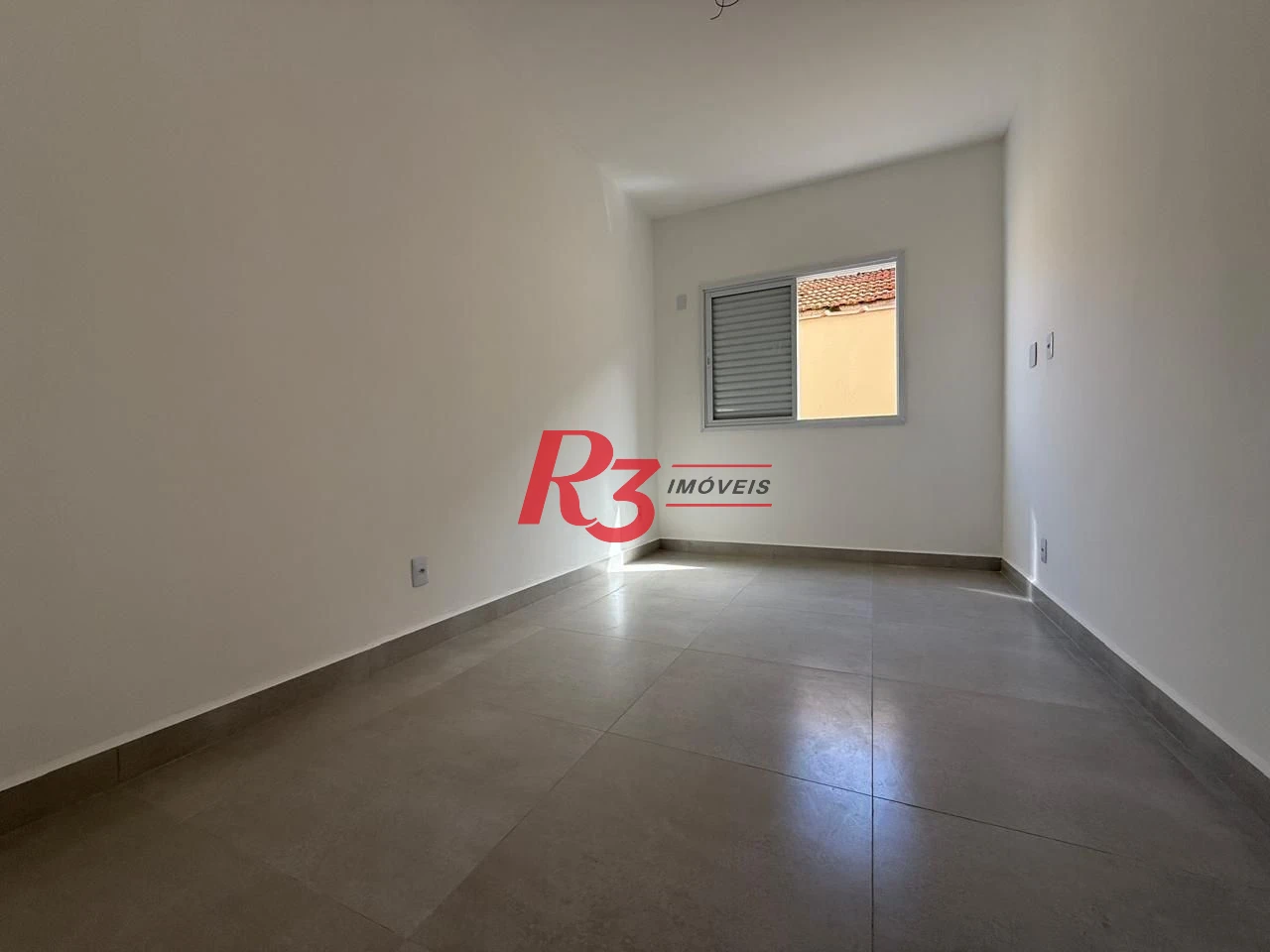Casa com 3 dormitórios à venda, 134 m² por R$ 600.000,00 - Estuário - Santos/SP