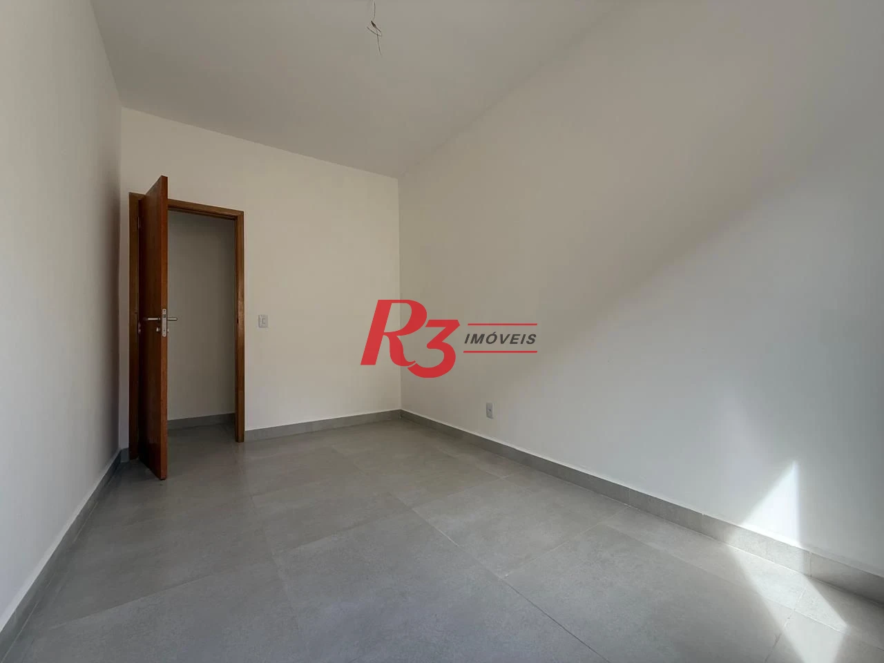 Casa com 3 dormitórios à venda, 134 m² por R$ 600.000,00 - Estuário - Santos/SP