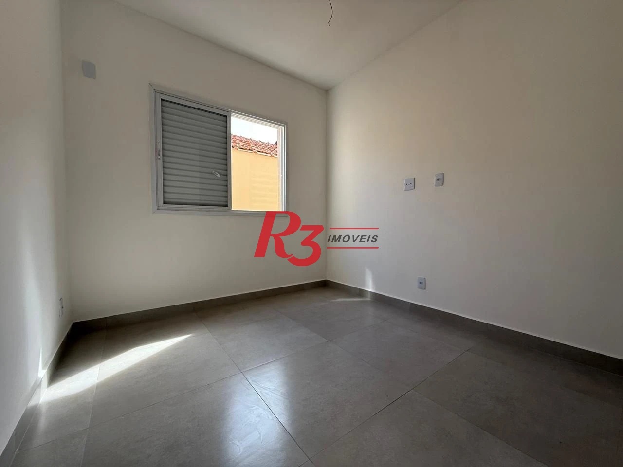 Casa com 3 dormitórios à venda, 134 m² por R$ 600.000,00 - Estuário - Santos/SP