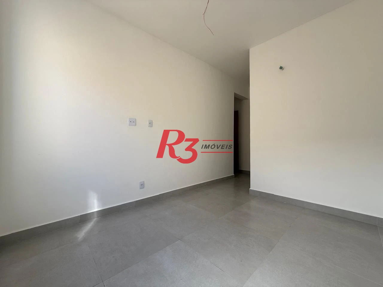 Casa com 3 dormitórios à venda, 134 m² por R$ 600.000,00 - Estuário - Santos/SP