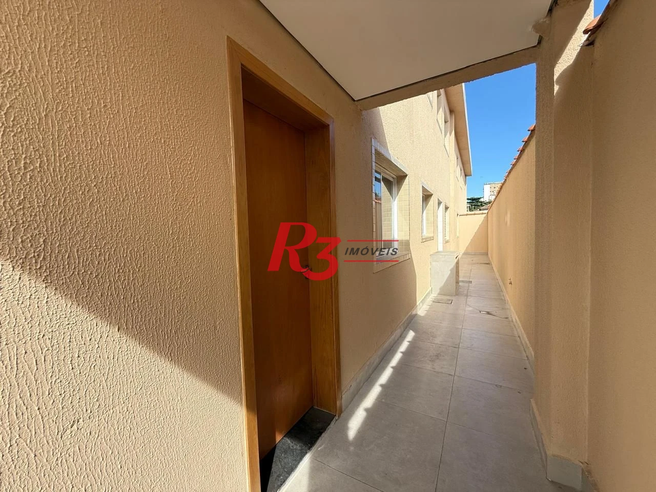 Casa com 3 dormitórios à venda, 134 m² por R$ 600.000,00 - Estuário - Santos/SP