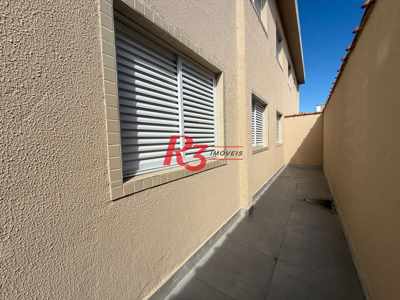 Casa com 3 dormitórios à venda, 134 m² por R$ 600.000,00 - Estuário - Santos/SP