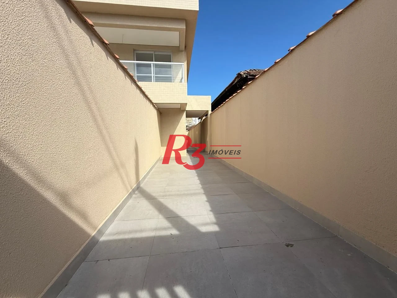 Casa com 3 dormitórios à venda, 134 m² por R$ 600.000,00 - Estuário - Santos/SP