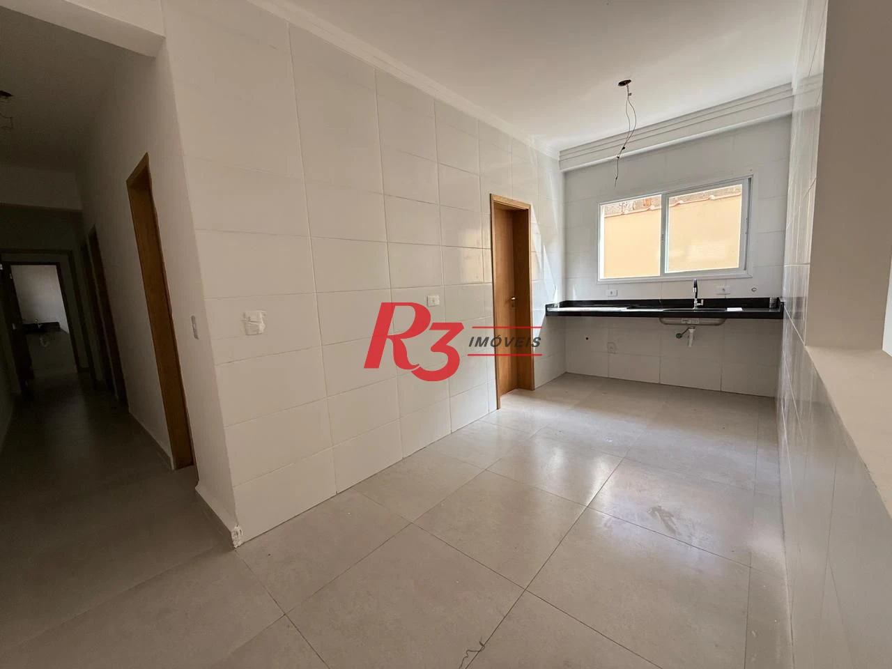 Casa com 3 dormitórios à venda, 134 m² por R$ 600.000,00 - Estuário - Santos/SP