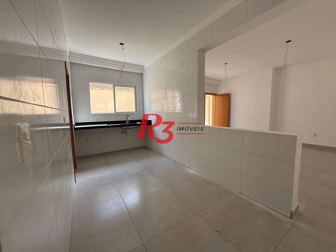 Casa com 3 dormitórios à venda, 134 m² por R$ 600.000,00 - Estuário - Santos/SP
