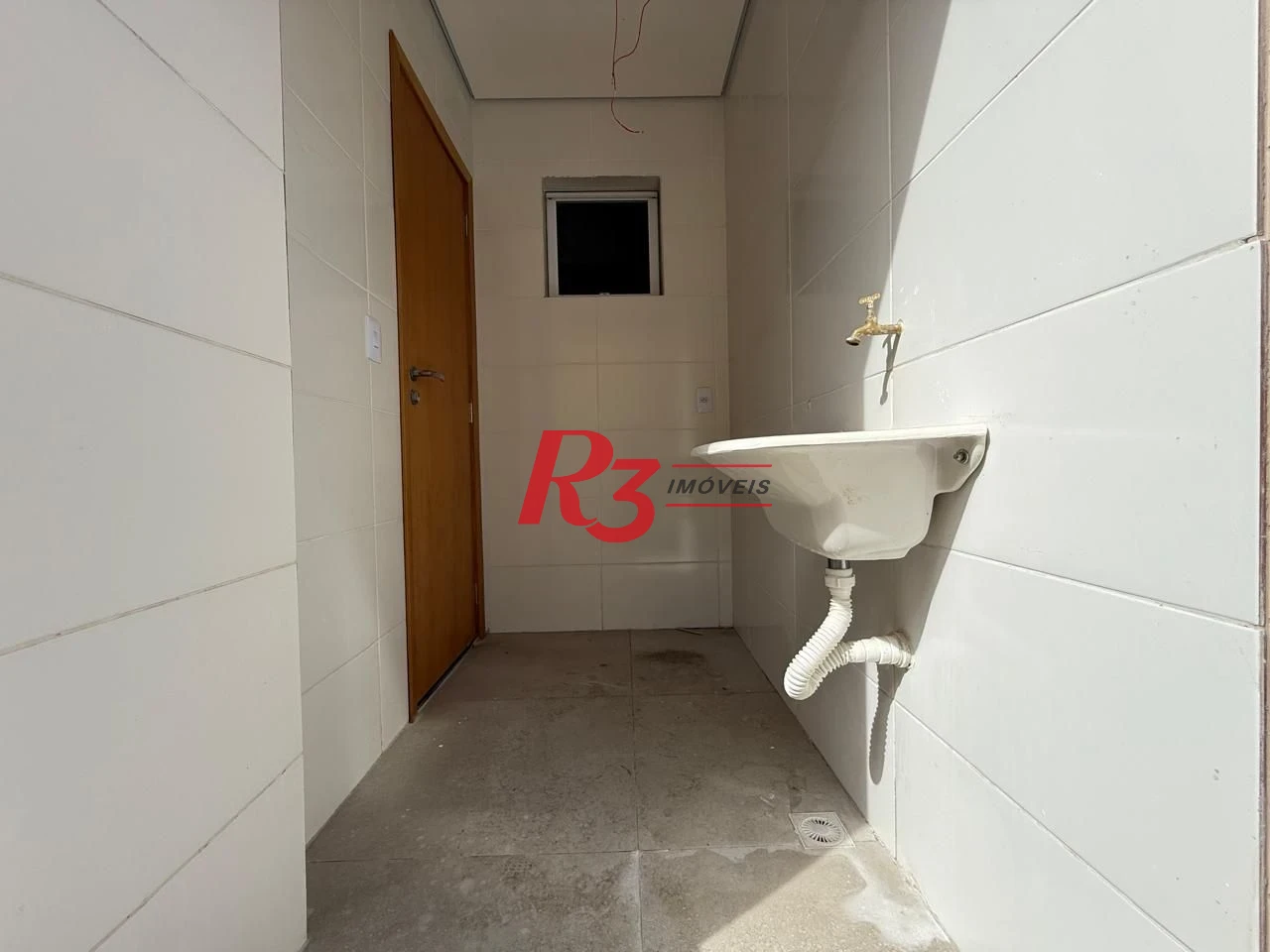 Casa com 3 dormitórios à venda, 134 m² por R$ 600.000,00 - Estuário - Santos/SP