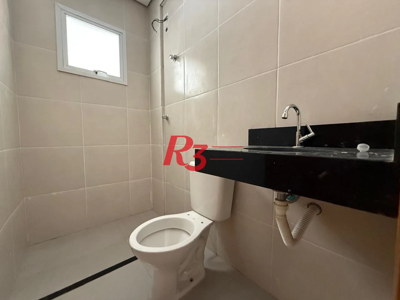 Casa com 3 dormitórios à venda, 134 m² por R$ 600.000,00 - Estuário - Santos/SP
