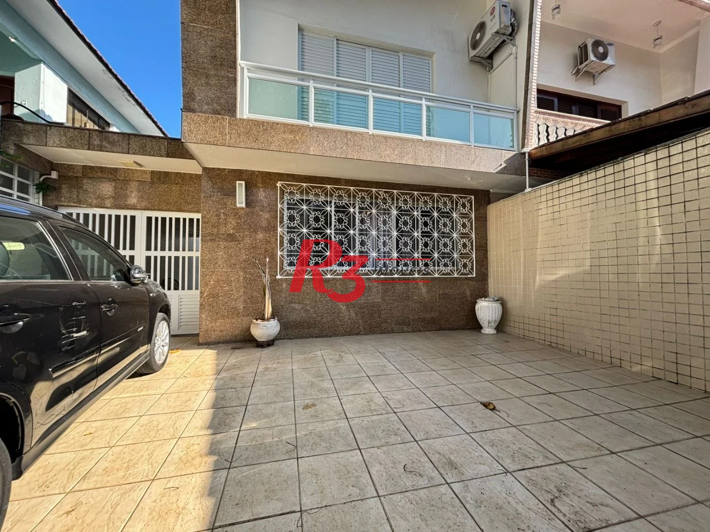 Sobrado com 3 dormitórios à venda, 187 m² por R$ 2.100.000,00 - Ponta da Praia - Santos/SP
