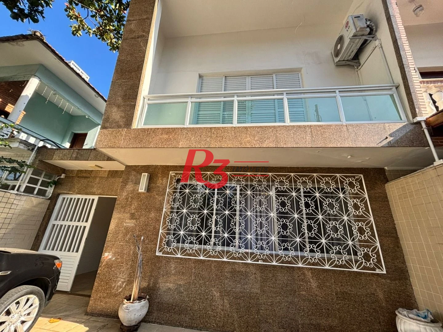 Sobrado com 3 dormitórios à venda, 187 m² por R$ 2.100.000,00 - Ponta da Praia - Santos/SP