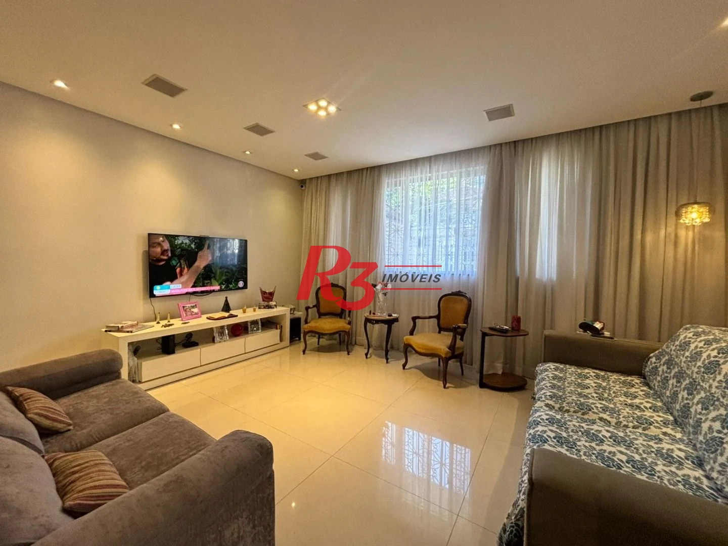 Sobrado com 3 dormitórios à venda, 187 m² por R$ 2.100.000,00 - Ponta da Praia - Santos/SP